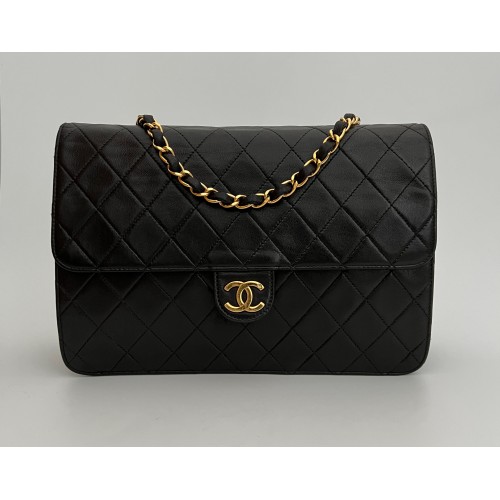 Chanel black leather vintage ref. 7233