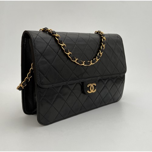 Chanel black leather vintage ref. 7404