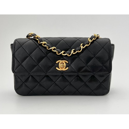 Cute Chanel black leather...