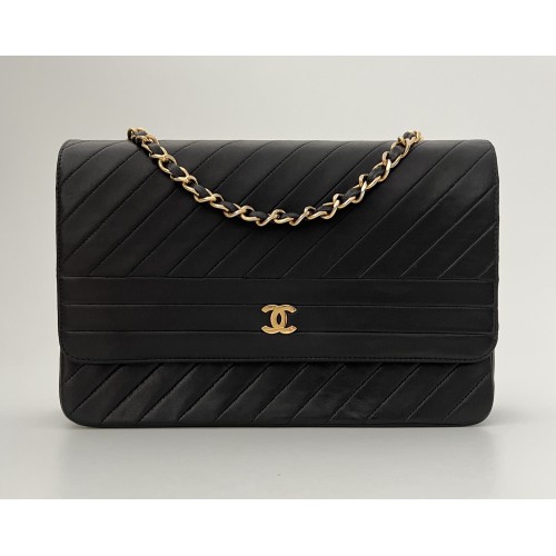 Chanel lines black leather...