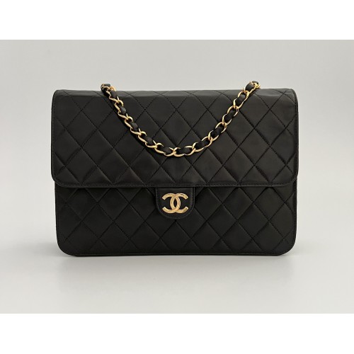 Chanel mid flap black...