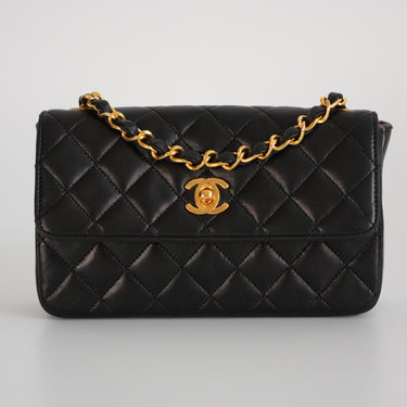 Chanel black leather mini vintage ref. 7946